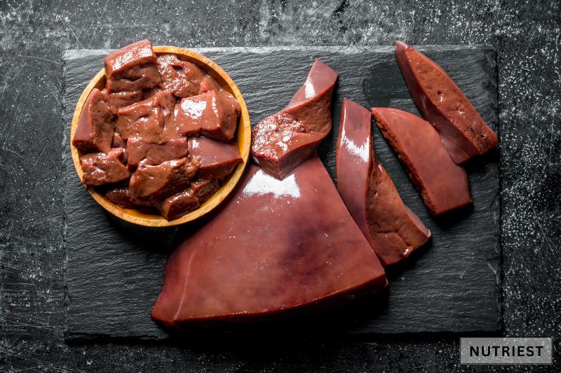 Raw beef liver rich in nutrients, often used as natural fertility boosters for reproductive health.